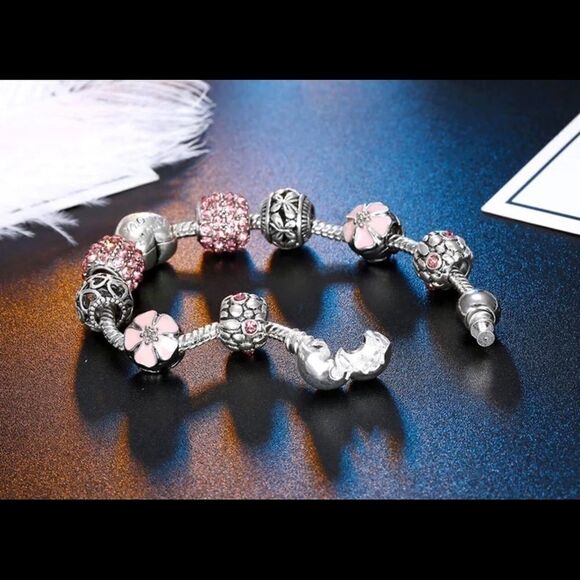 TRENDY PINK 9 PIECE CHARM BRACELET - Picture 3 of 4